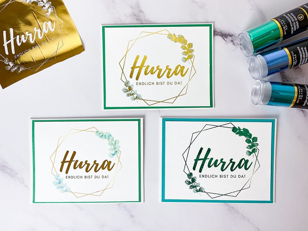Hurra-Geburtskarten mit Toner-Transferfolie in Gold, Türkis und Schwarz gestaltet